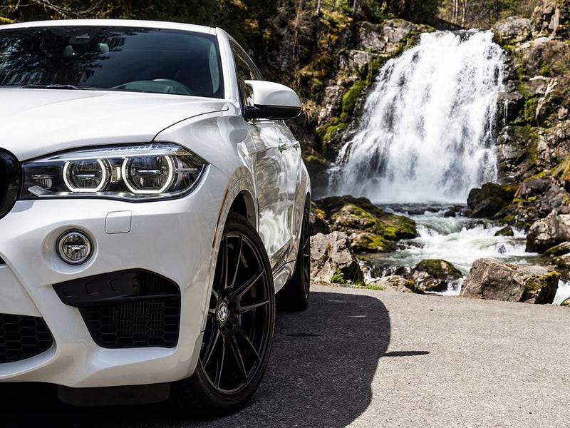 BMW X5 wrapped in Hexis Gloss HX20000 Polar White restyling film HX20001B