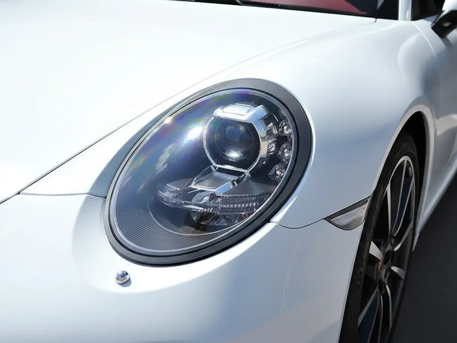 Porsche 911 wrapped in Matte HX20000 Lapland White wrap film HX20002M