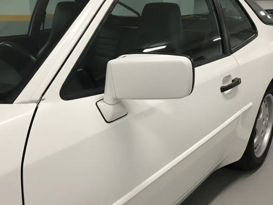 Porsche 944 wrapped in Matte HX20000 Glacier White vinyl wrap HX20003M