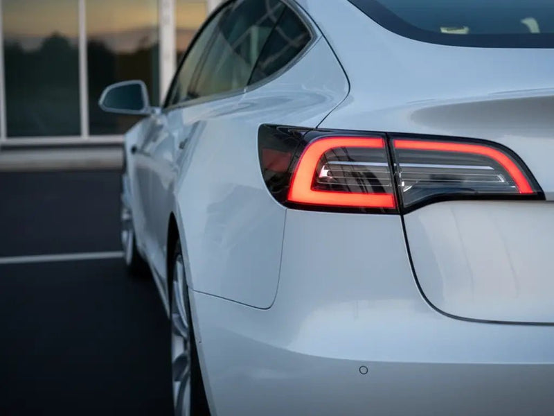 Tesla 3 wrapped in Hexis Gloss HX20000 Mountain Peak White wrap film HX20012B