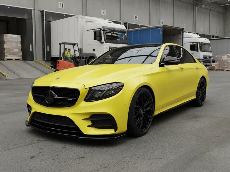 Mercedes-Benz E-Class wrapped in Matte HX20000 Lemon Yellow automotive vinyl film HX20108M