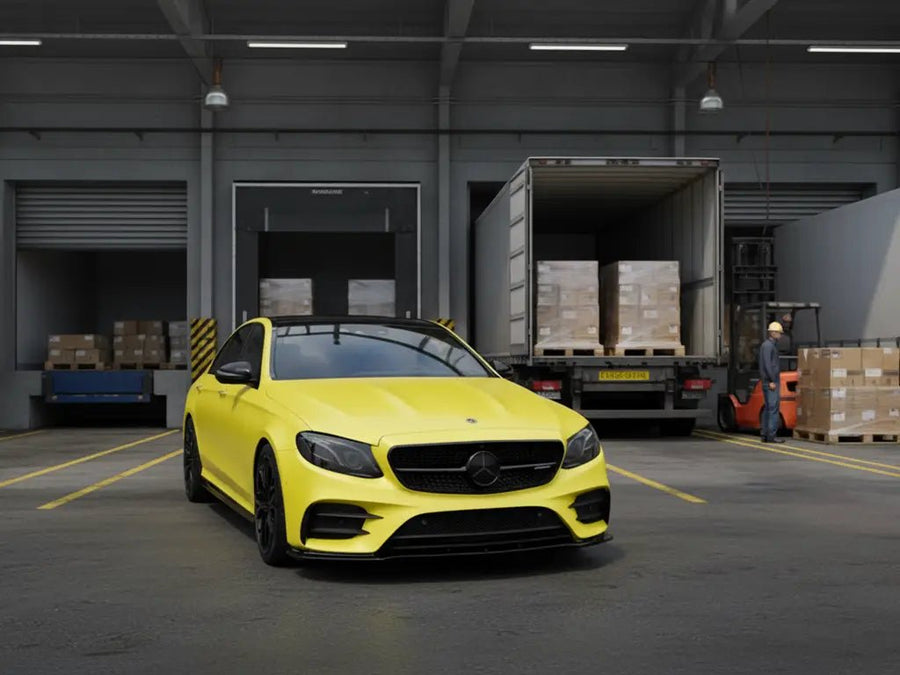Mercedes-Benz E-Class Coupe wrapped in Matte HX20000 Lemon Yellow automotive vinyl film HX20108M