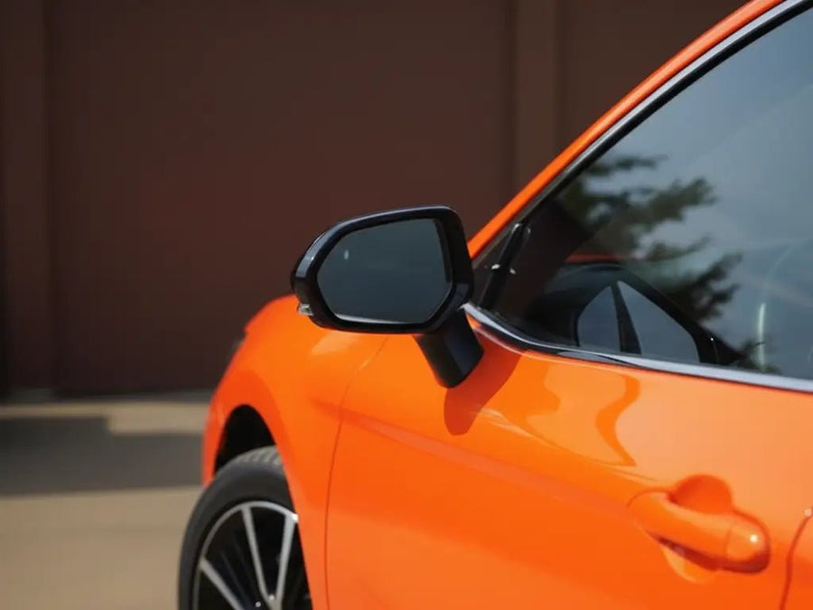 Car wrapped in Gloss HX20000 Orange Red car wrap film HX20165B