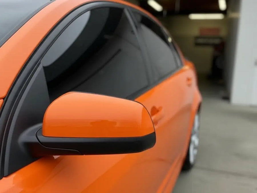 Audi S4 wrapped in Hexis Gloss HX20000 Orange Red restyling film HX20165B
