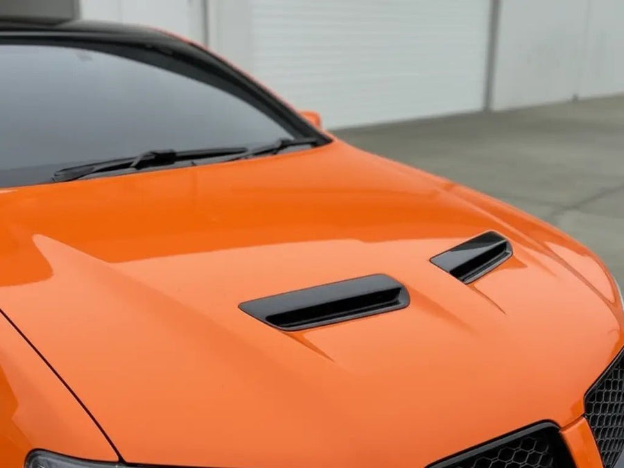 Pontiac G8 wrapped in Hexis Gloss HX20000 Orange Red restyling film HX20165B detail