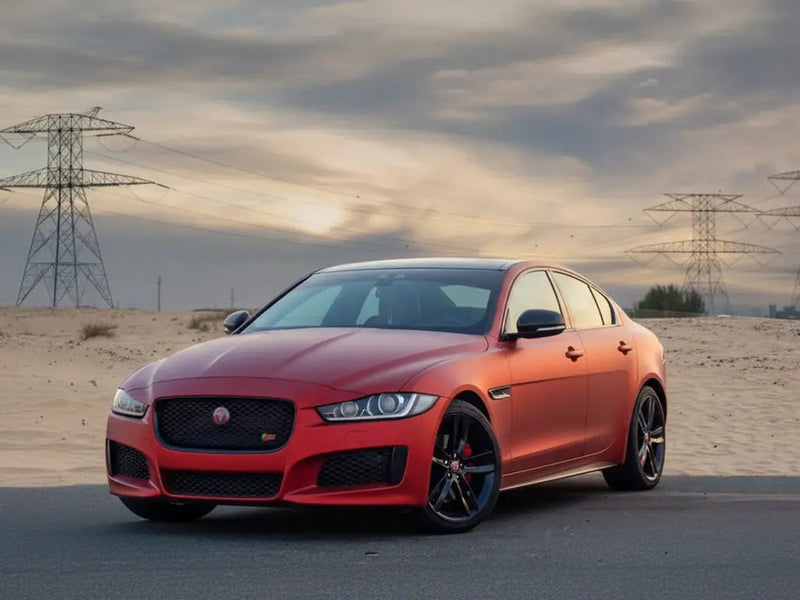 Jaguar XE wrapped in Satin HX20000 Red Aluminum wrap film HX20196S