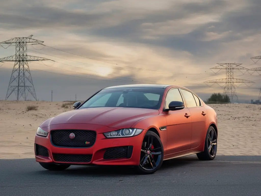 Jaguar XE wrapped in Satin HX20000 Red Aluminum wrap film HX20196S