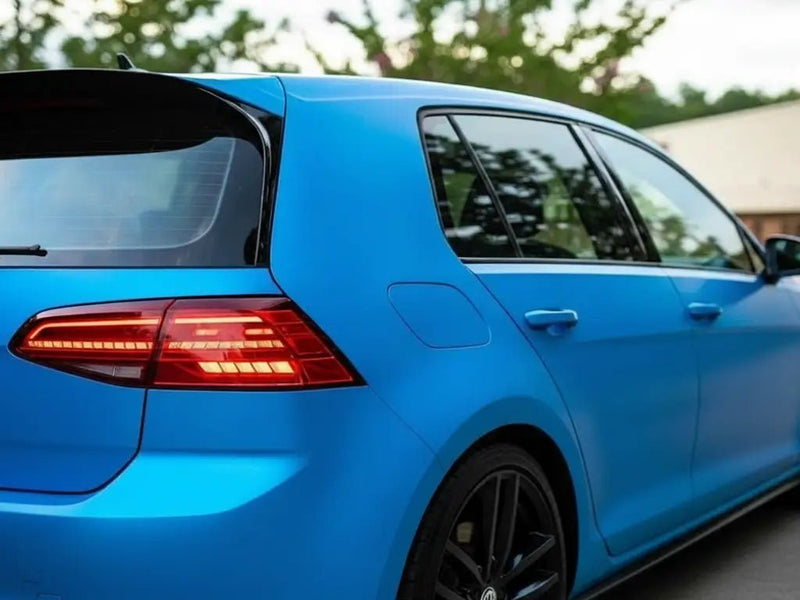 Volkswagen Golf wrapped in Hexis Satin HX20000 Ara Blue car wrap film HX20219S