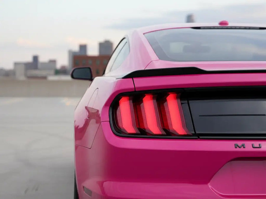 Ford Mustang wrapped in Hexis Gloss HX20000 Fuchsia car wrap film HX20220B
