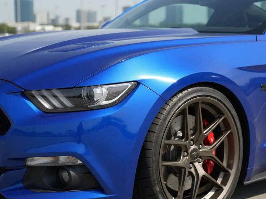 Ford Mustang wrapped in Hexis Gloss HX20000 Pacific Blue automotive vinyl film HX20280B