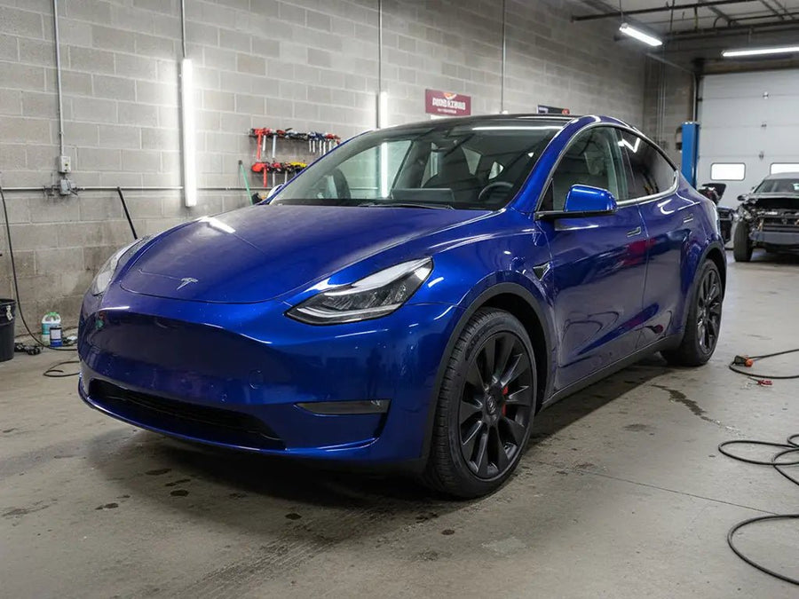 Tesla Y wrapped in Hexis Gloss HX20000 Night Blue car wrap film HX20281B
