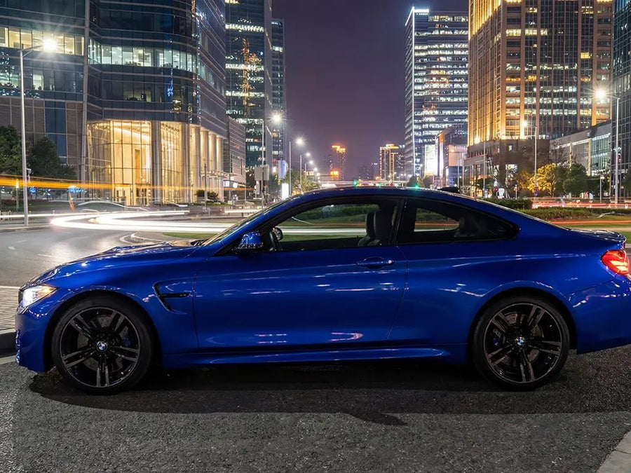 BMW M4 wrapped in Gloss HX20000 Sapphire Blue vinyl wrap HX20300B
