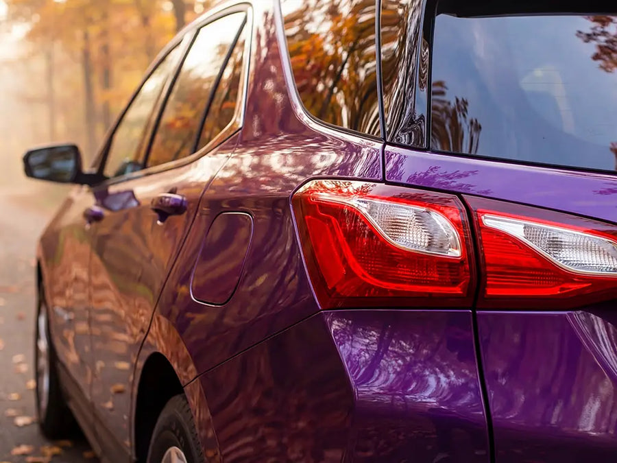 Car wrapped in Gloss HX20000 Elderberry Purple wrap film HX20352B