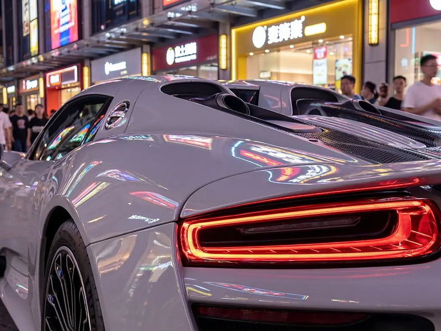 Porsche 918 Spyder wrapped in Hexis Gloss HX20000 Cloud Grey vinyl wrap HX20428B