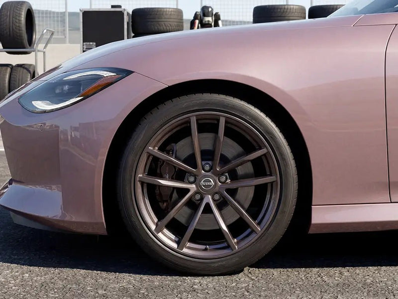 Nissan Z wrapped in Hexis Gloss HX20000 Metallic Cinder Rose automotive vinyl film HX20437B