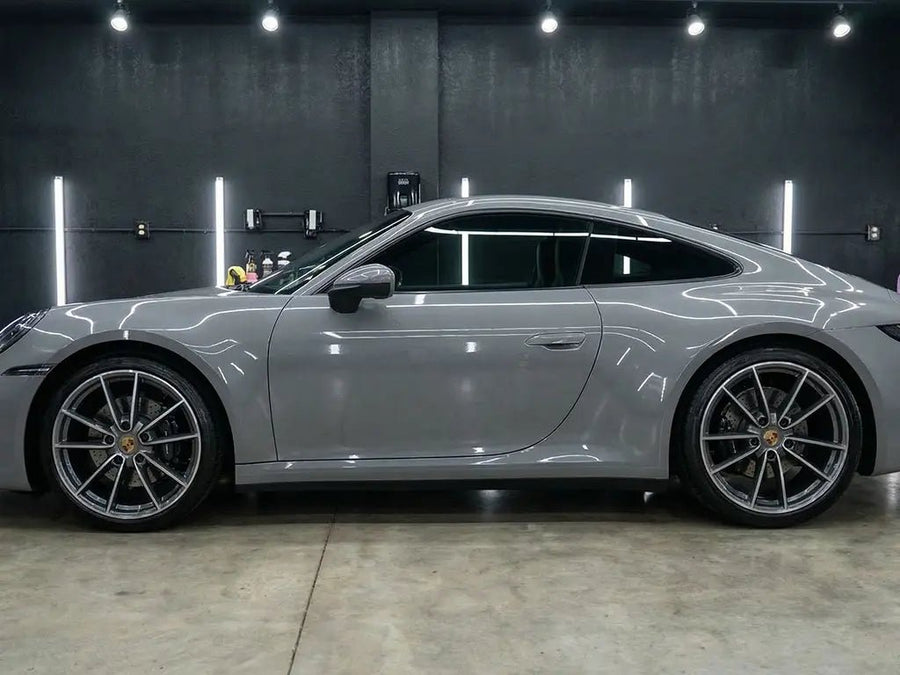 Porsche 911 wrapped in Hexis Gloss HX20000 Pearl Grey restyling film HX20445B