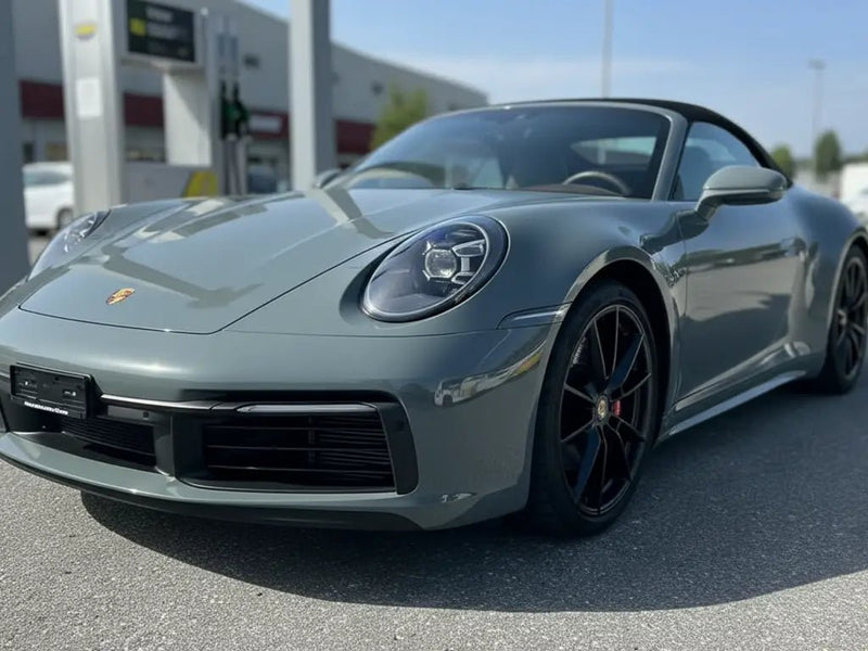 Porsche 911 wrapped in Gloss HX20000 Elephant Grey restyling film HX20446B