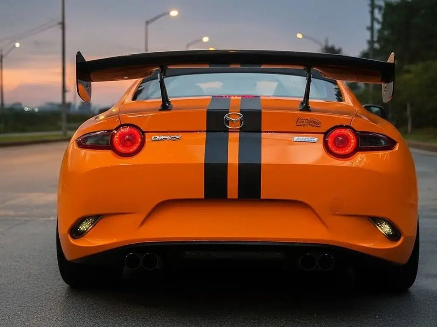 Mazda MX-5 Miata wrapped in Hexis Gloss HX20000 Urban Orange wrap film HX20495B