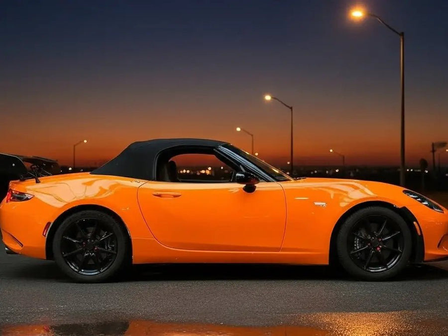Mazda MX-5 Miata wrapped in Hexis Gloss HX20000 Urban Orange vinyl wrap HX20495B