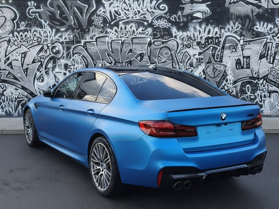 BMW M5 wrapped in Hexis Satin HX20000 Racing Light Blue restyling film HX20521S
