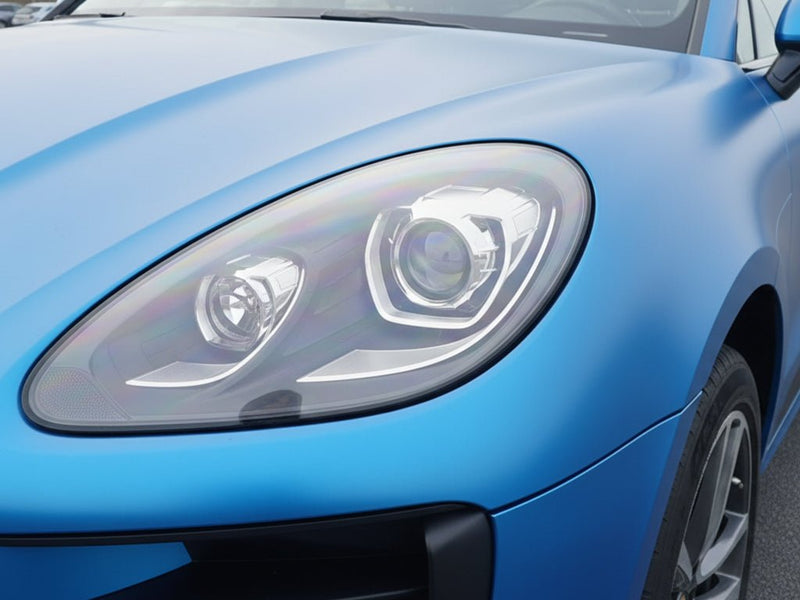 Porsche Macan wrapped in Hexis Satin HX20000 Racing Light Blue restyling film HX20521S