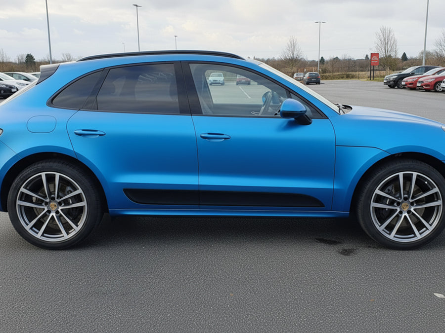 Porsche Macan wrapped in Satin HX20000 Racing Light Blue restyling film HX20521S