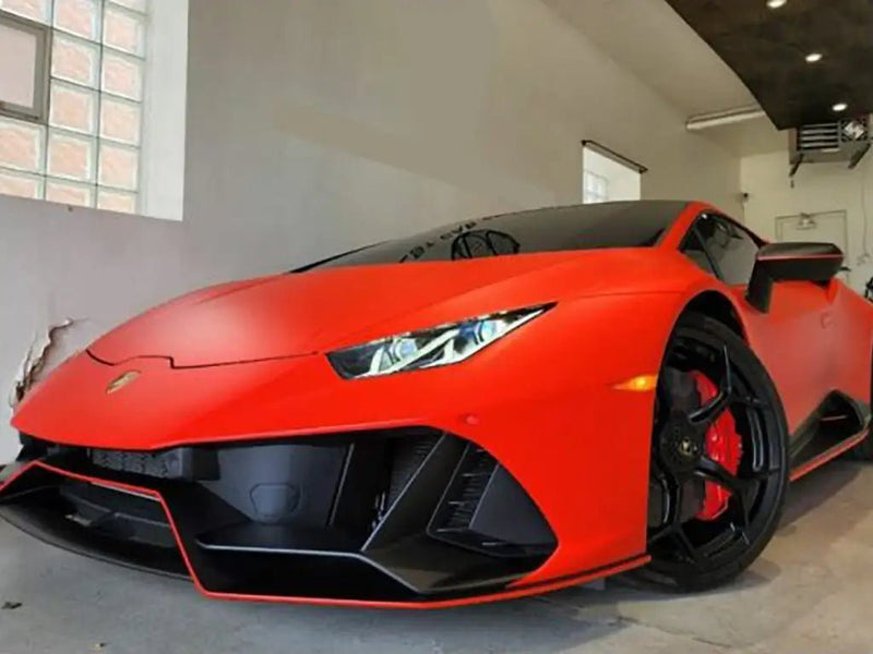 Lamborghini Huracán wrapped in Satin HX20000 Fluorescent Red automotive vinyl film HX20615S