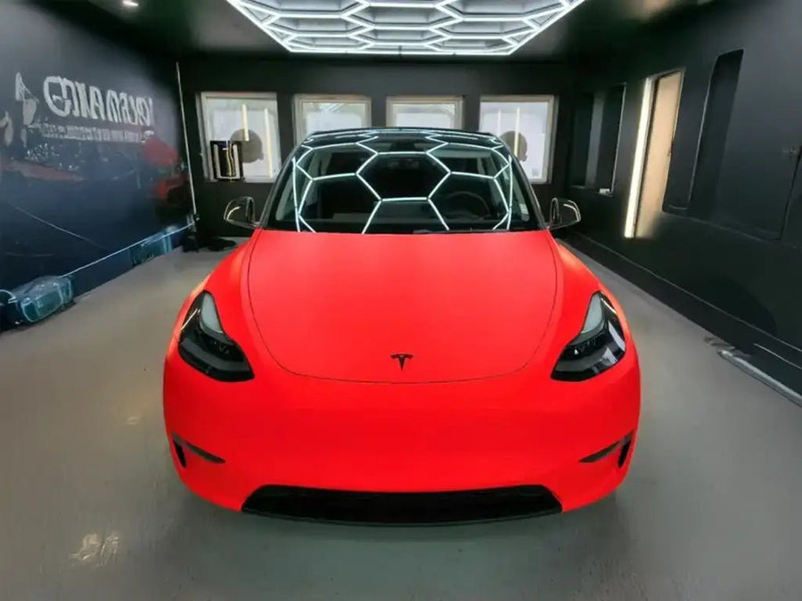 Tesla 3 wrapped in Satin HX20000 Fluorescent Red automotive vinyl film HX20615S