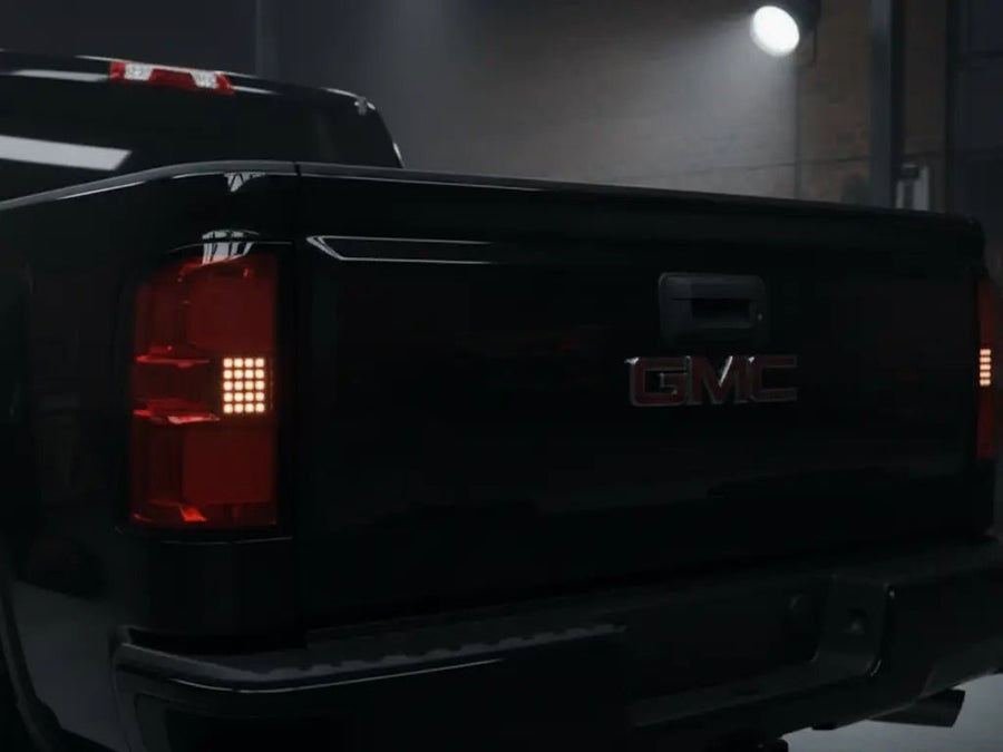 GMC Sierra wrapped in Hexis Gloss HX20000 Coal Black wrap film HX20889B