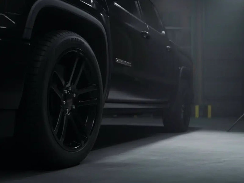 GMC Sierra wrapped in Gloss HX20000 Coal Black restyling film HX20889B