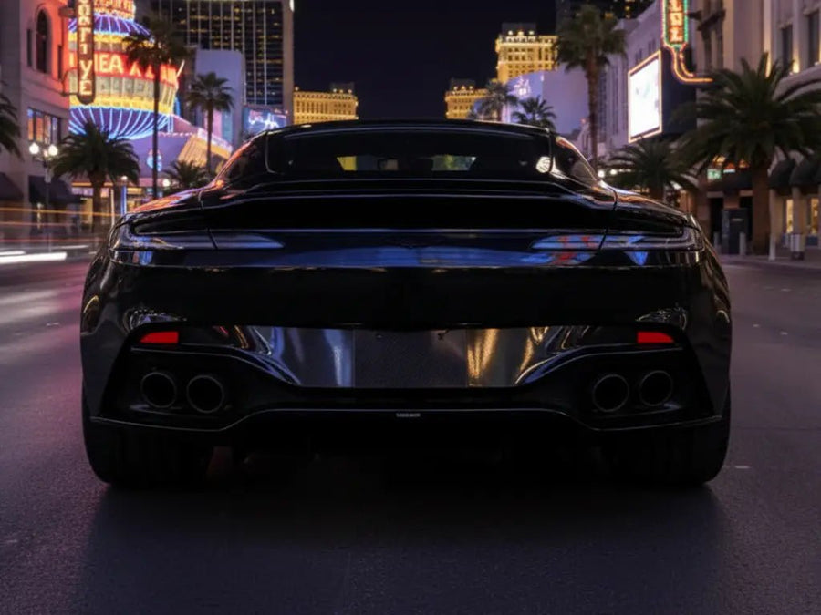 Aston Martin DB11 wrapped in Hexis Gloss HX20000 Coal Black vinyl wrap HX20889B