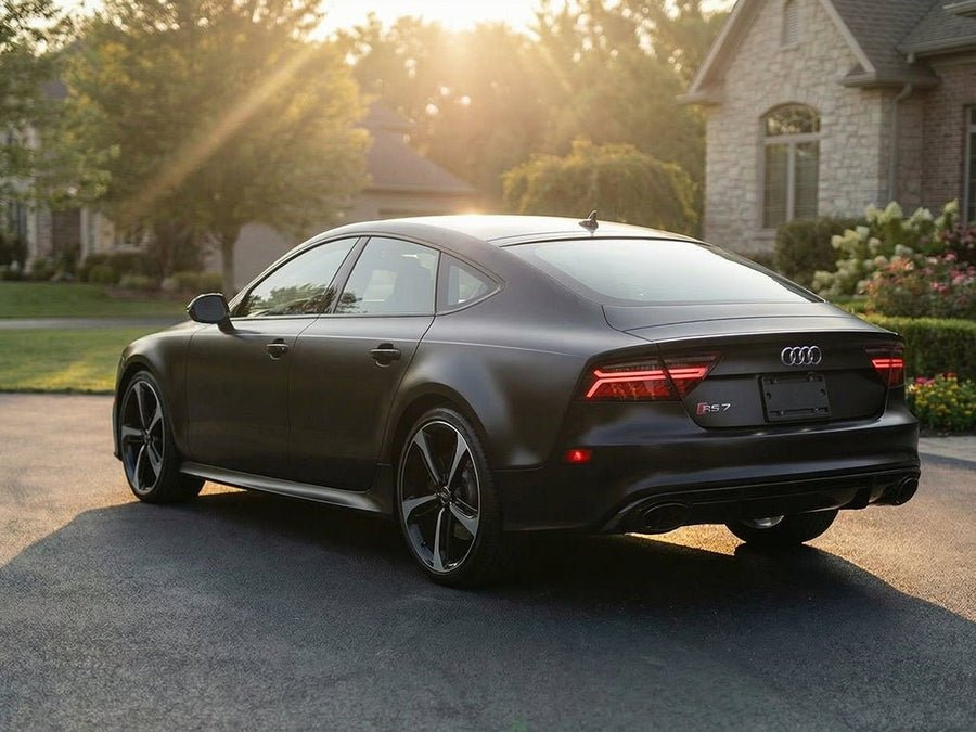 Audi RS7 wrapped in Hexis Satin HX20000 Deep Black Wet automotive vinyl film HX20890W