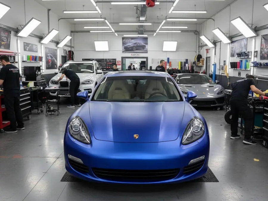 Porsche Panamera wrapped in Hexis Matte HX20000 Metallic Night Blue automotive vinyl film HX20905M