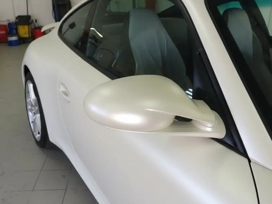 Porsche 911 wrapped in Hexis Satin HX20000 Nacre White automotive vinyl film HX20BNCS
