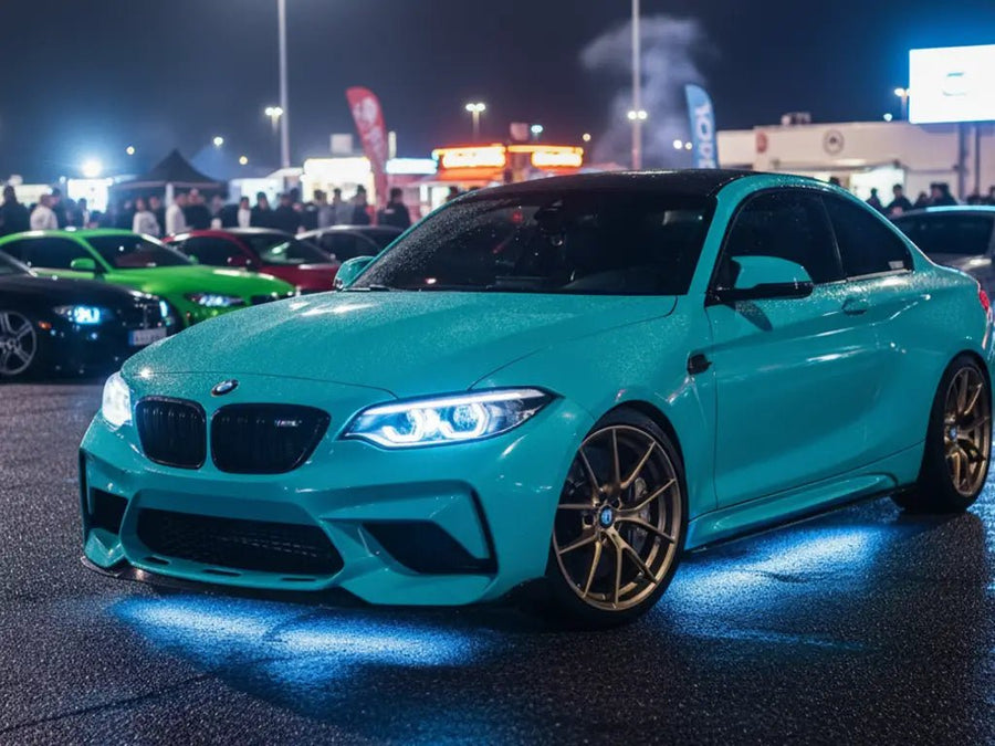 BMW M2 wrapped in Hexis Gloss HX20000 Ti Blue wrap film HX20BTIB