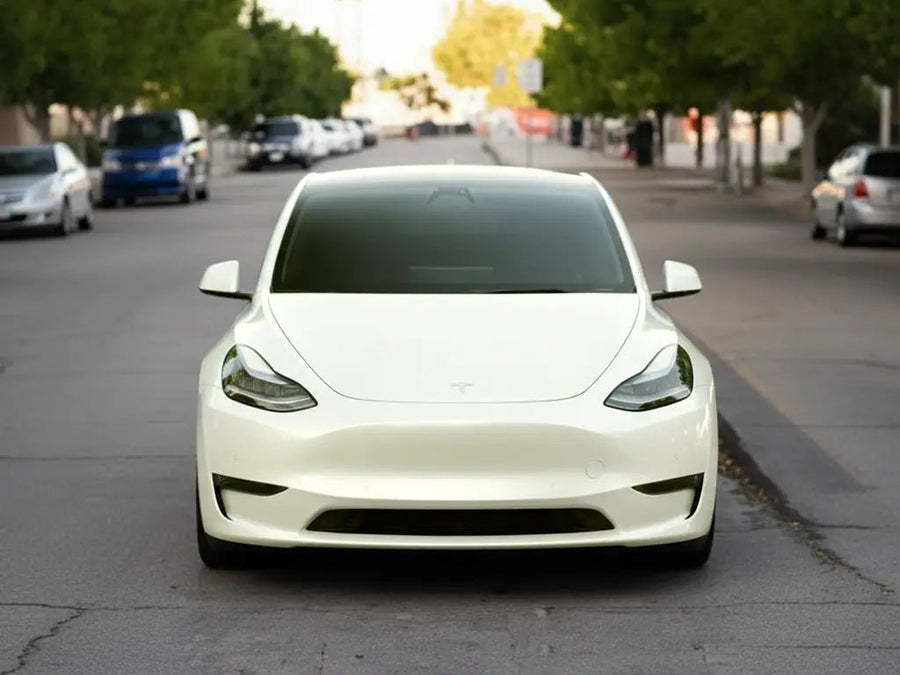 Tesla Y wrapped in Gloss HX20000 Taxi Beige automotive vinyl film HX20BTXB