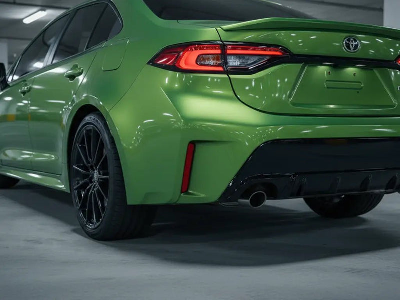Toyota Corolla wrapped in Gloss HX20000 Fairway Green wrap film HX20VFAB