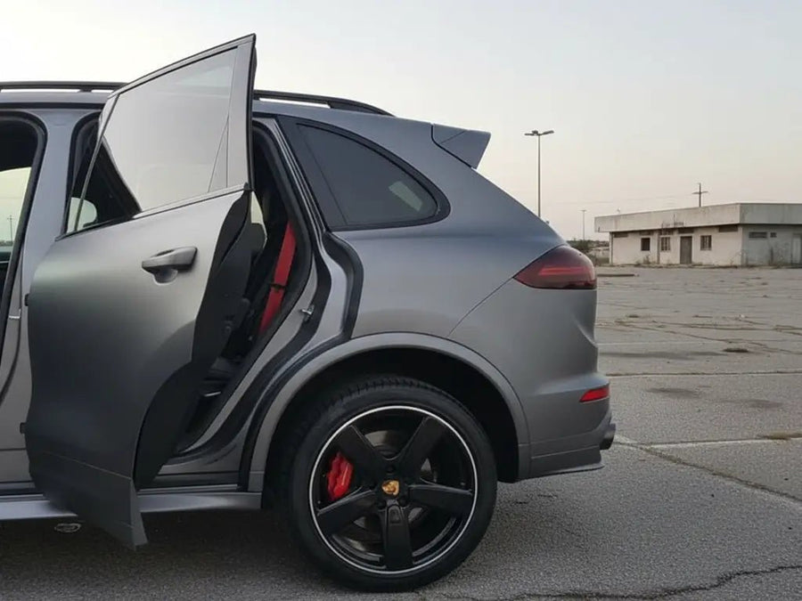 Porsche Cayenne wrapped in Hexis Satin HX20000 Argentic Grey wrap film HX20G04S