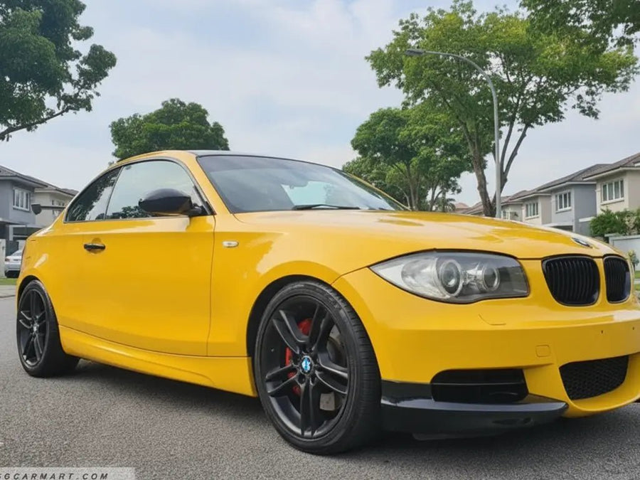 BMW 1 Series Coupe wrapped in Gloss HX20000 Honey Yellow automotive vinyl film HX20JMIB