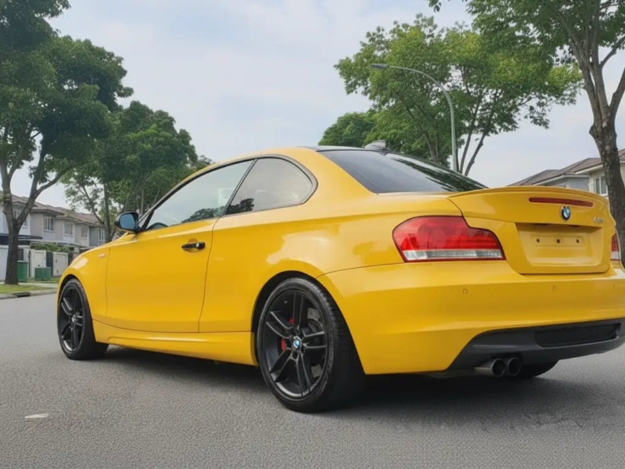 BMW 1 Series Coupe wrapped in Hexis Gloss HX20000 Honey Yellow vinyl wrap HX20JMIB