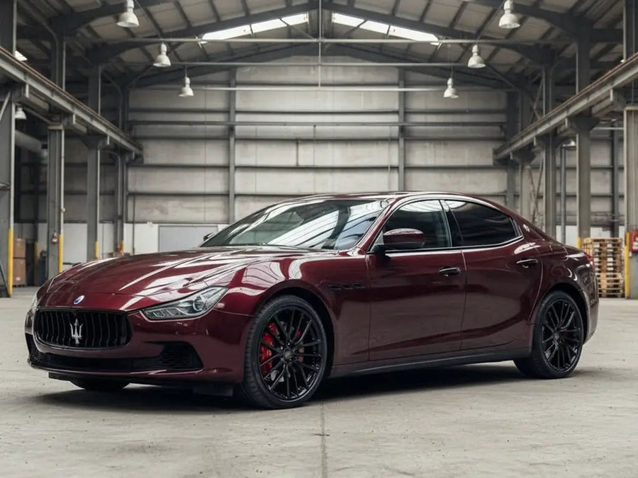 Maserati Ghibli wrapped in Gloss HX20000 Vampire Black wrap film HX20N03B