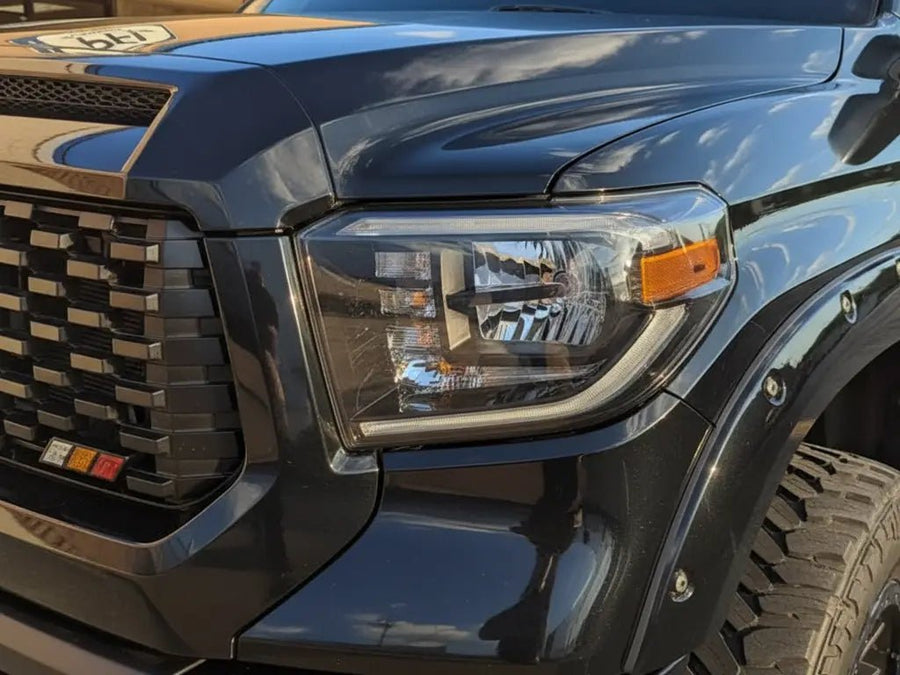 Toyota Tacoma wrapped in Hexis Gloss HX20000 Mystery Black wrap film HX20NMYB