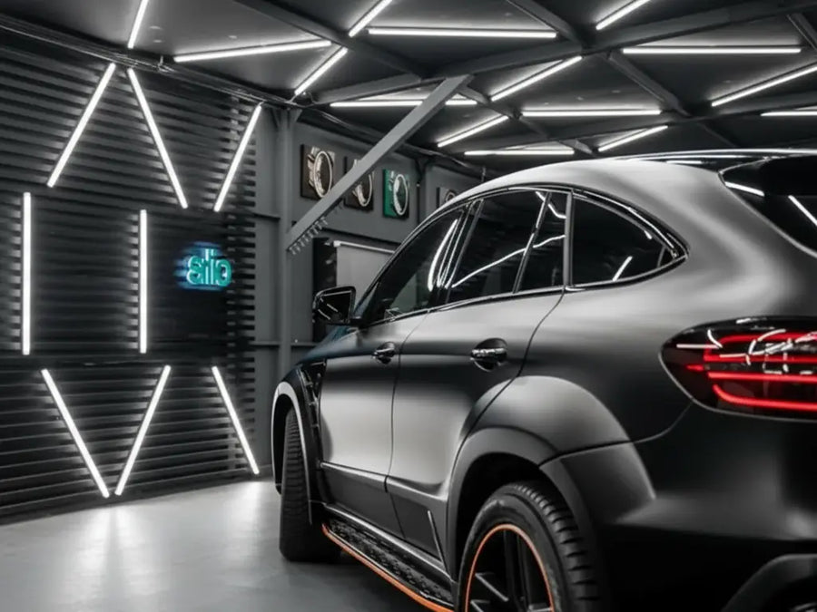 DIY BMW X6 wrapped in Matte HX20000 Deep Black automotive vinyl film HX20NPRM