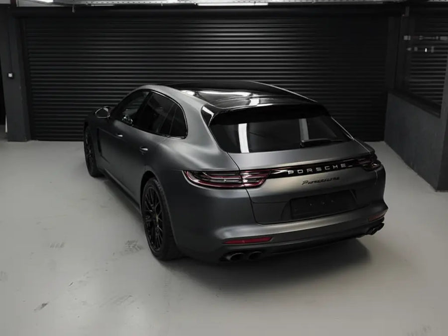 Porsche Panamera wrapped in Matte HX20000 Deep Black wrap film HX20NPRM detail