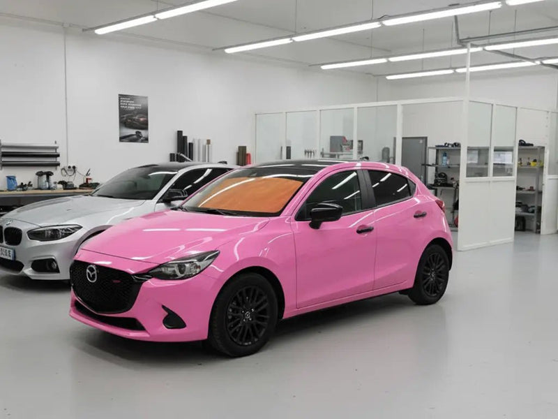 Mazda 2 wrapped in Hexis Gloss HX20000 Lady Pink wrap film HX20R11B
