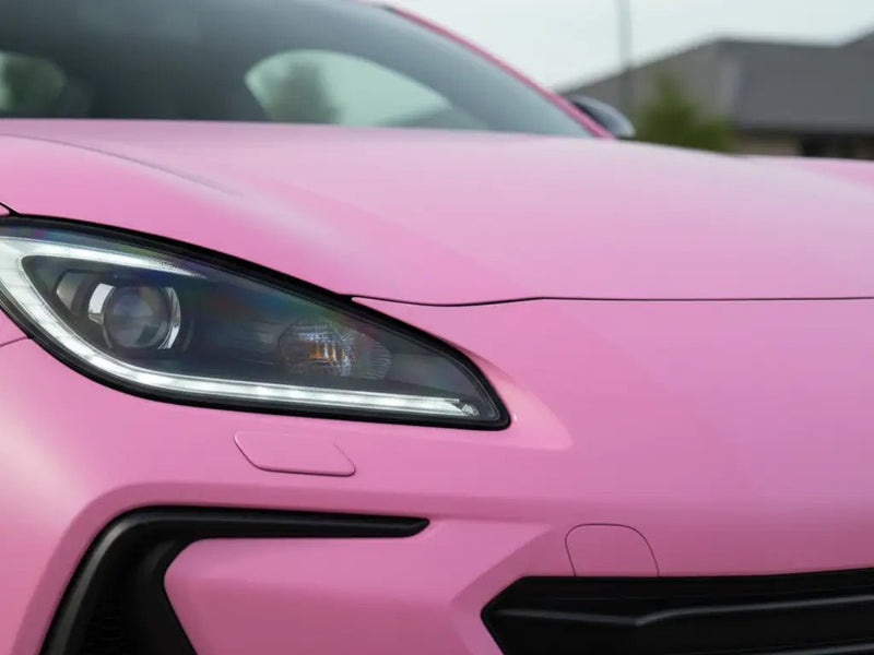 Porsche 718 Cayman wrapped in Hexis Satin HX20000 Lady Pink wrap film HX20R11S