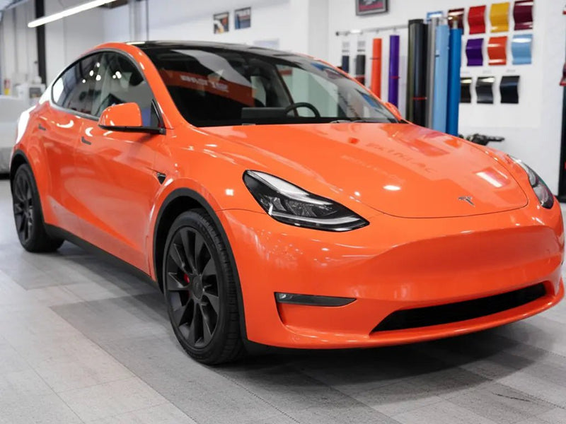 Tesla Y wrapped in Hexis Gloss HX20000 Light Red vinyl wrap HX20R21B