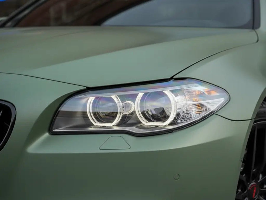 BMW 5 Series wrapped in Hexis Satin HX20000 Hercules Green restyling film HX20V28S