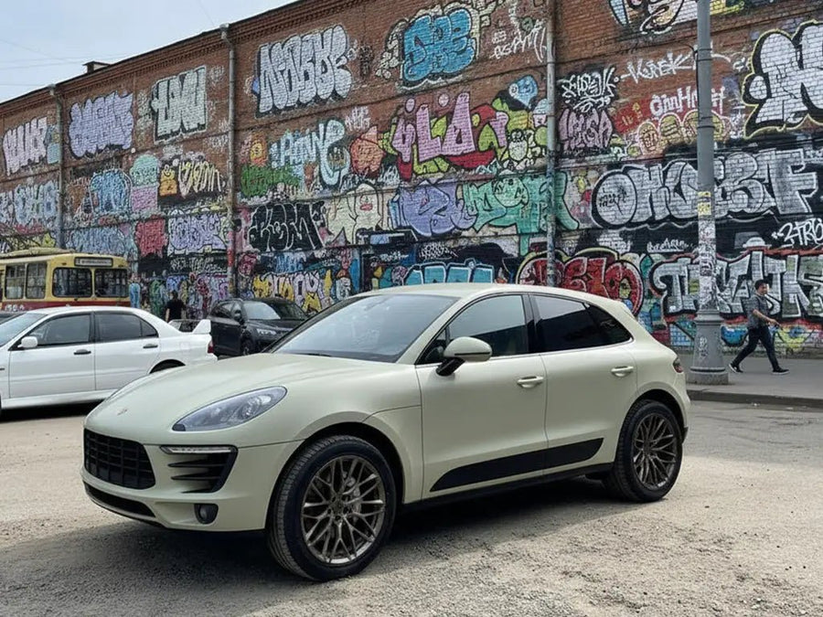 Porsche Macan wrapped in Matte HX20000 Adventure Green wrap film HX20VAVM