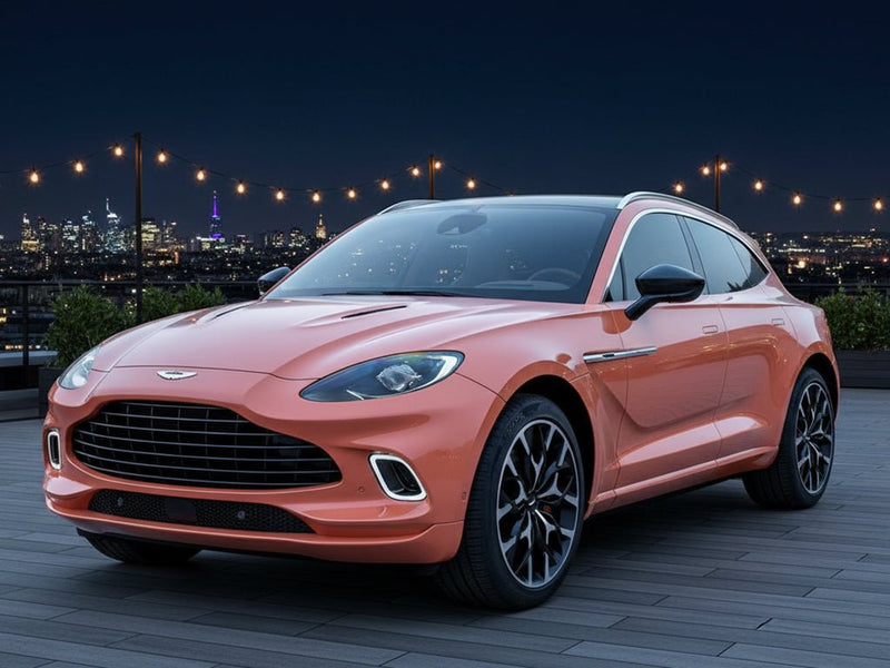 Aston Martin DBX wrapped in SuperGloss HXONE™ Phoenix Ocher car wrap film HXONE301